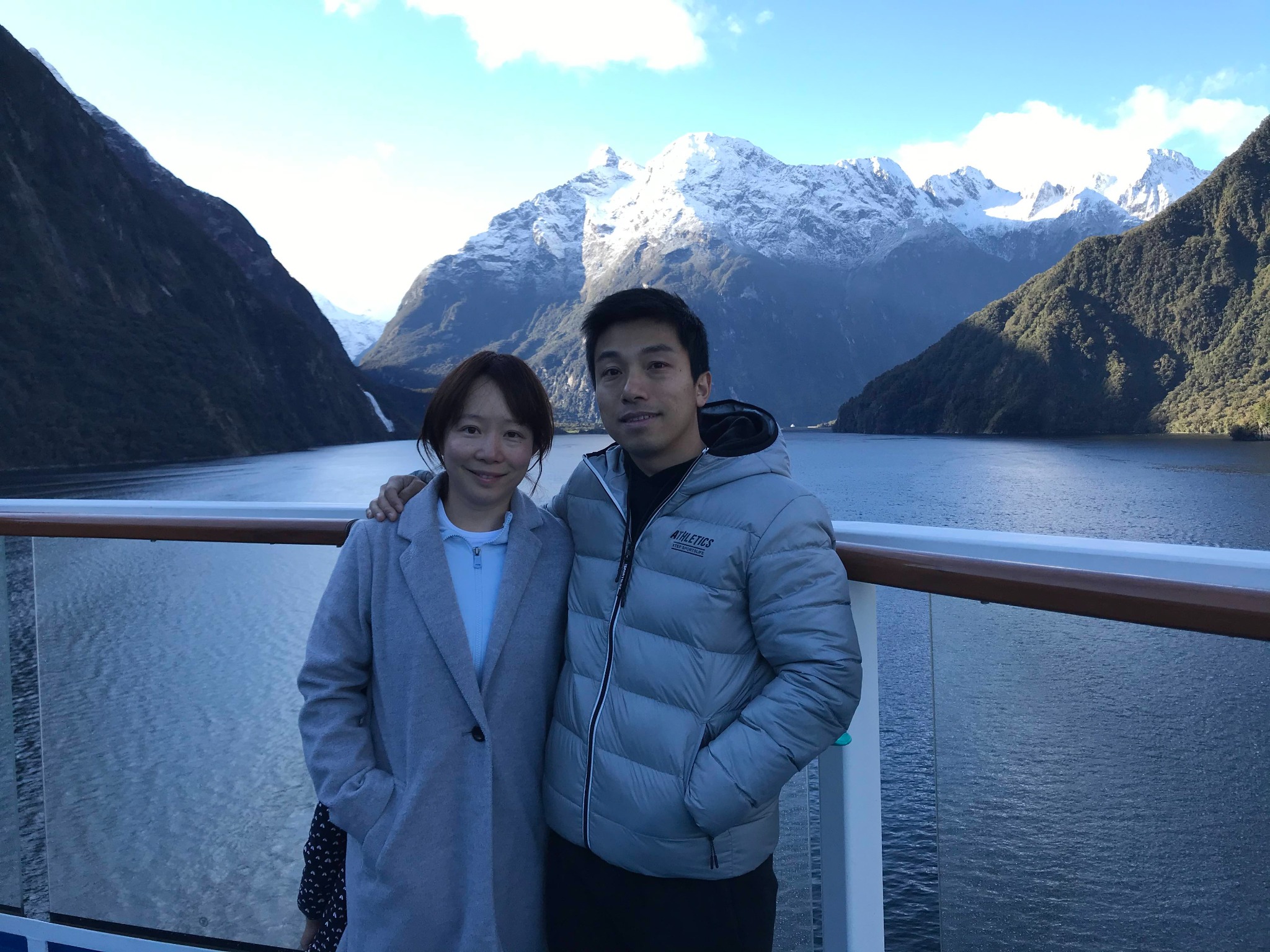 Your LOMI hosts traveling at Milford Sound, New Zealand